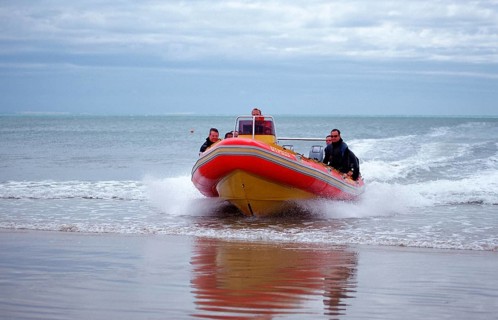 Beach landing by rubber dinghy, South Africa, Port Elizabeth, Ibhayi, Africa
