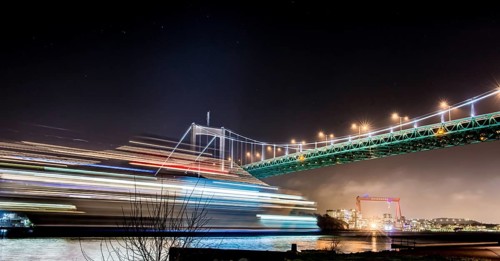 Gothenburg, Sweden, January 4 2014: A ferry passing the Älvsborgs bridge. Long exposure, Europe