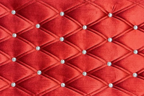 Red upholstery pattern with zircons decoration background