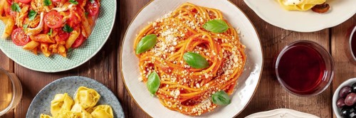 Pasta panorama. Assortment of Italian pastas, with spaghetti Bolognese, seafood pasta, penne with