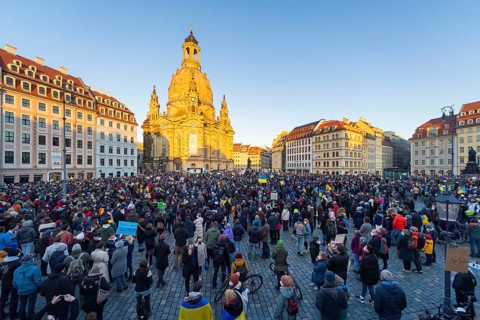 In Dresden, about 3, 000 people gathered on Neumarkt in front of the Church of Our Lady. On posters