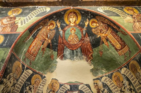 The painted interior of the barn-roofed Church of Archangelos Michail or Church of St. Michael the