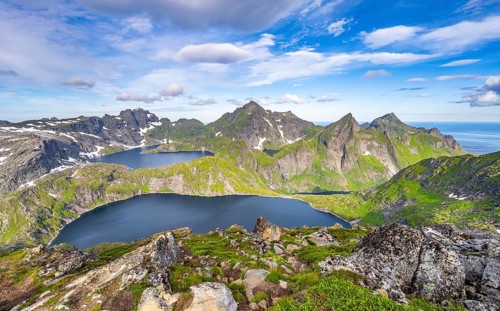 Mountain landscape with steep rocky peaks and lake Tennesvatnet and Krokvatnet, Hermannsdalstinden