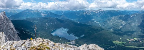 Aerial view, summit cross of the Waxenstein, Eibsee lake and Wetterstein mountains,