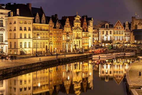 Medieval buildings of the Korenlei Quay on the river Leie at dusk, Ghent, Belgium, Europe