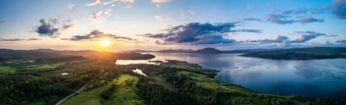 Panorama of sunset over Tobermory from a drone, Isle of Mull, Scottish Inner Hebrides, Scotland, UK
