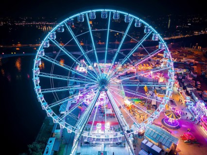 A 55m high illuminated Ferris wheel is the landmark of the fair at the Volksfest grounds on