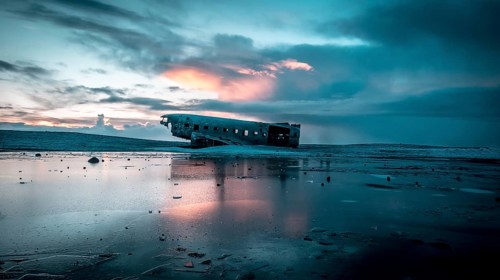 Plane crashed on frozen Solheimasandur beach in winter with snow in Iceland