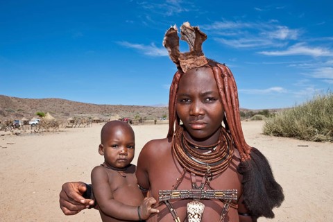 Himba woman with baby, Damaraland, Namibia, Africa