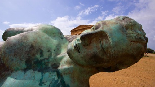 Bronze statue of fallen Icarus, deatil, head, Concordia temple, valley of the temples, valle dei