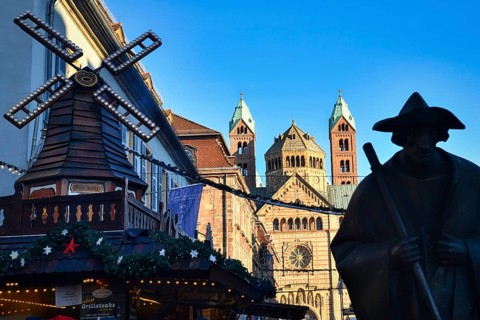 Speyer, Germany, January 2020: Silhouette of pilgrim statue called 'Jakobspilger', with Christmas