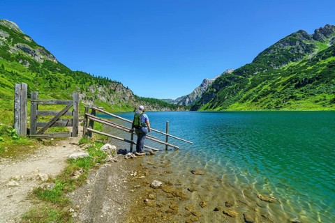 Hiker at Tappenkarsee, mountain lake, Radstätter Tauern, landscape conservation area, Kleinarl,