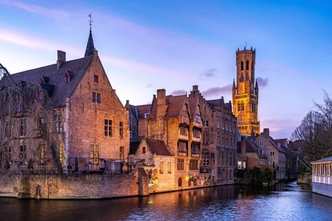 Rozenhoedkaai canal with belfry at dusk, Bruges, Belgium, Europe