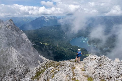 Mountaineer at Waxenstein with fog, Eibsee lake, Wetterstein Mountains, Garmisch-Patenkirchen,