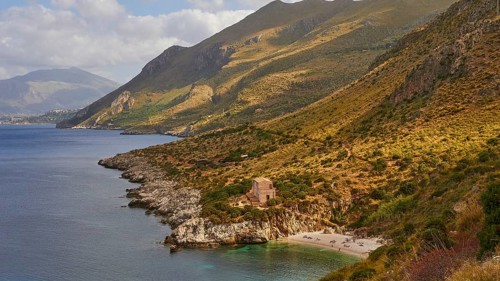 Cloudy weather, coastline, green coastal mountains, small bay, pebble beach, bathers, Zingaro,