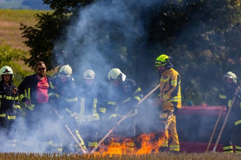 During controlled field fires, the firefighters were able to test various extinguishing methods,