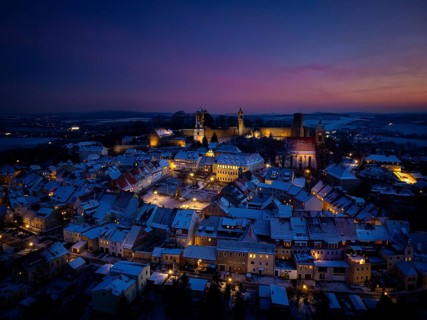 Castle and town of Stolpen on a winter evening