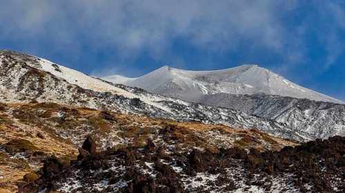 Lava scree, snow-capped peaks, blue sky, white clouds, Etna, volcano, Eastern Sicily, Sicily,