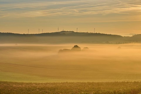Landscape, fields, wind turbines, fog, sunrise, Höhefeld, Wertheim, Baden-Württemberg, Germany,