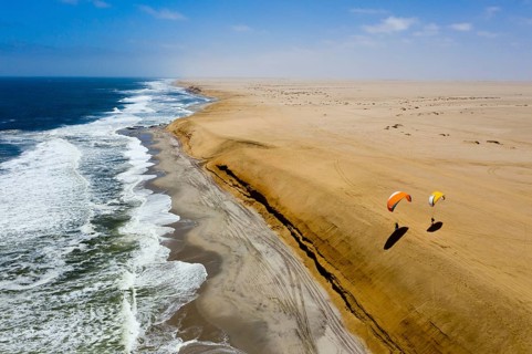 Paragliding on the dune at Henties Bay, Henties Bay, Namibia, Africa