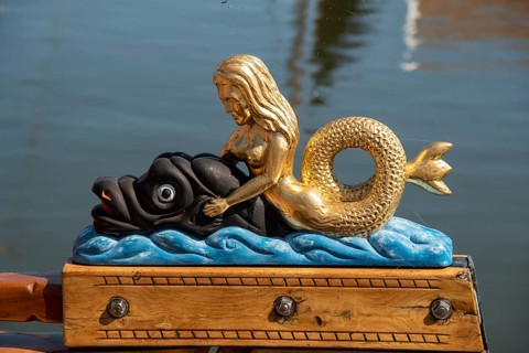 Enkhuizen, Netherlands, June 2022. The decorated helm stol of a barge at the Zuiderzee Museum in