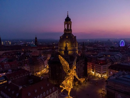 Dresden's old town from above.The glass dome of the Academy of Arts, crowned by a Fama figure,