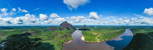 Black river and white sand beach before the granite hills, Cerros de Mavecure, Eastern Colombia