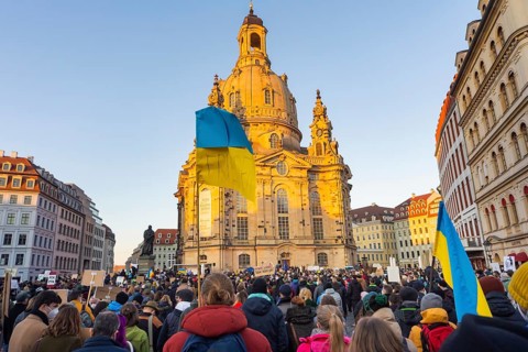 In Dresden, about 3, 000 people gathered on Neumarkt in front of the Church of Our Lady. On posters