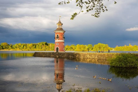 Lighthouse at the Fasanenschlösschen in Moritzburg with thunderstorm sky