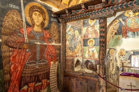 The painted interior of the barn-roofed Church of Archangelos Michail or Church of St. Michael the