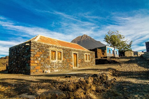 Stonehouse with vulcano in background. Fogo. Cabo Verde. Africa