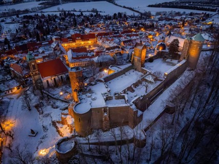 Castle and town of Stolpen on a winter evening