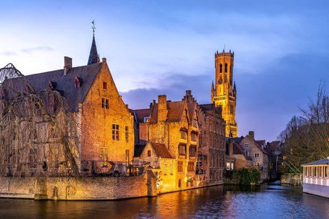 Rozenhoedkaai canal with belfry at dusk, Bruges, Belgium, Europe