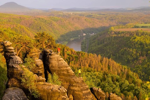 View of the Schrammstein in the Elbe Sandstone Mountains Looking upstream from the Elbe. Leisurely