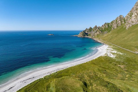 White sandy beach and mountains near Bleik, Andoya Island, Vesteralen, Norway, Europe