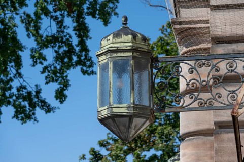 Historic lantern at the side portal of the justice building, built between 1909 and 1916 in the