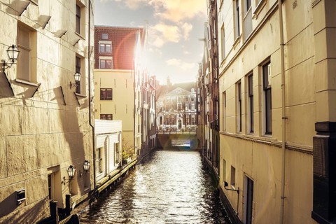 View of an Amsterdam canal at sunset