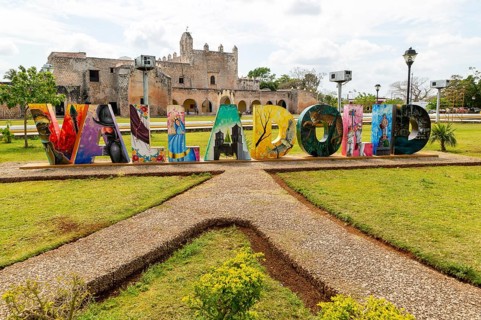 Colourful lettering sign for Valladolid, Yucatan, Mexico in front of Convent of San Bernardino of