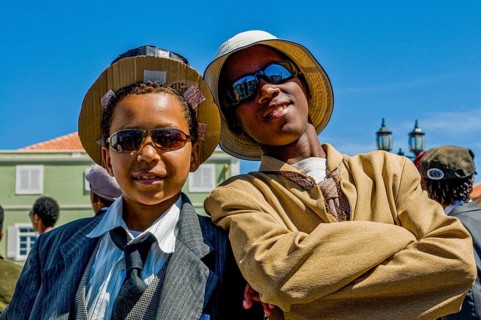 Young men, dressed as businesspeople. Carnival. Mindelo. Cabo Verde. Africa
