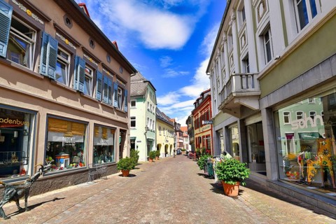Ladenburg, Germany, July 2020: Mains trees with shops in historical city center dating back to