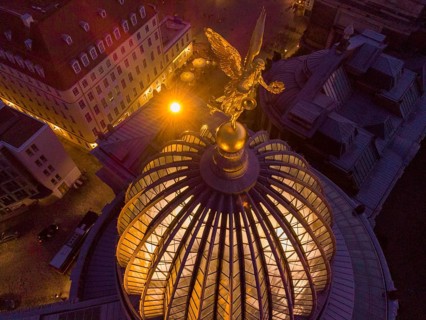 Dresden's old town from above.The glass dome of the Academy of Arts, crowned by a Fama figure,