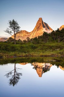 Norway's national mountain Stetind reflected in small lake, Tysfjord, Ofoten, Norway, Europe