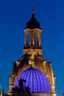 The portal of the new Saxon art society, the Fama dome and the dome of the Church of Our Lady in