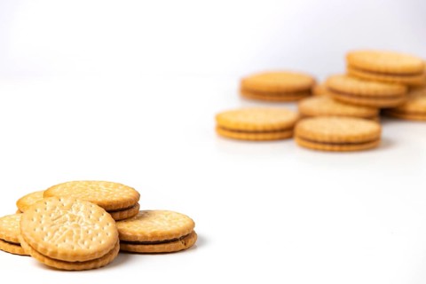 Double biscuits, white background, copy space