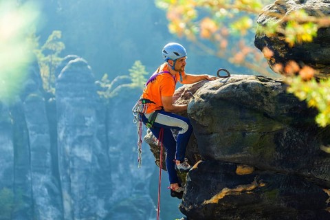 Climbers in Rathen in Saxon Switzerland