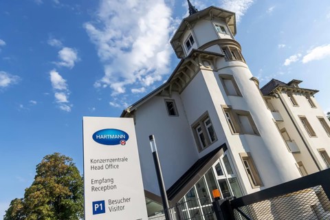 Hartmann Group with company logo on the building, company for medical products and care products,
