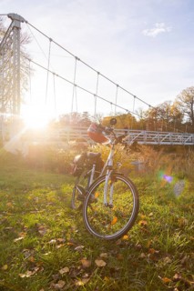 Symbolic image Resting on an e-bike tour in the Leipzig region in Grimma at the Mulde bridge