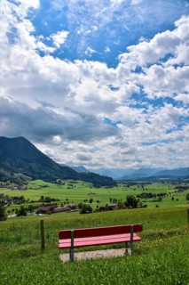 Resting bench on the Gebhardshöhe above the municipality of Rettenberg in Allgäu, Bavaria, Germany,
