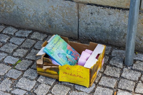 Used offer with toys on a street in Dresden Gruna
