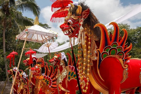 In the cremation ground, the colourful sarcophagi at a corpse cremation (Ngaben), Ubud, Bali,